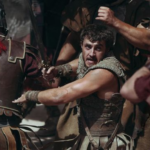 Review Film Gladiator Memicu Saham PARAA Menguat Tinggi